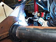 When welding steel pipes, what should be done to the pipe ends