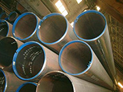 What are the application characteristics and trends of Q420QE straight seam welded pipe in engineering projects
